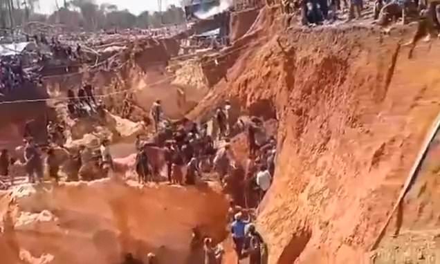 Dozens are feared dead in gold mine collapse as more than 100 workers are trapped in 114ft illegal pit run by gangsters in  Venezuela