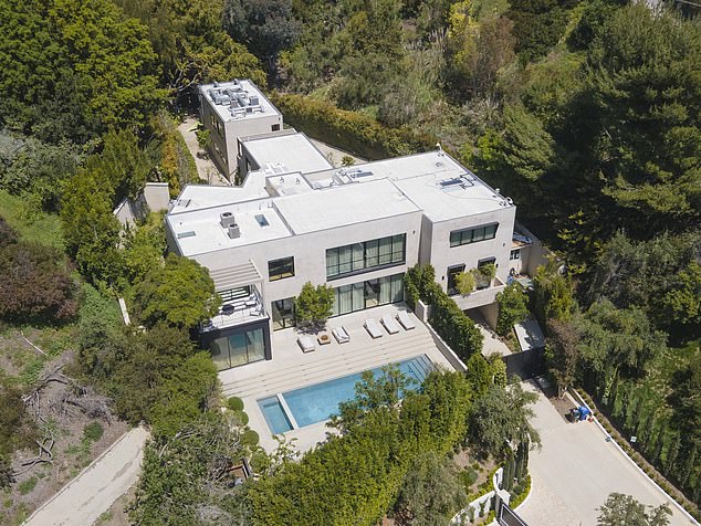 Kylie Jenner and ex-boyfriend Travis Scott re-list their Beverly Hills mansion for m a year after their split
