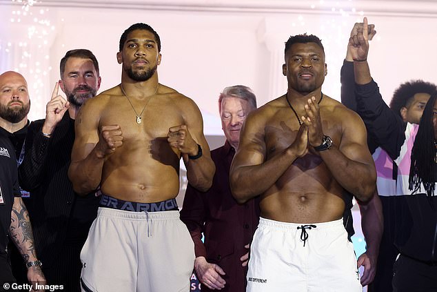 Anthony Joshua weighs in 20lbs lighter than Francis Ngannou ahead of Friday