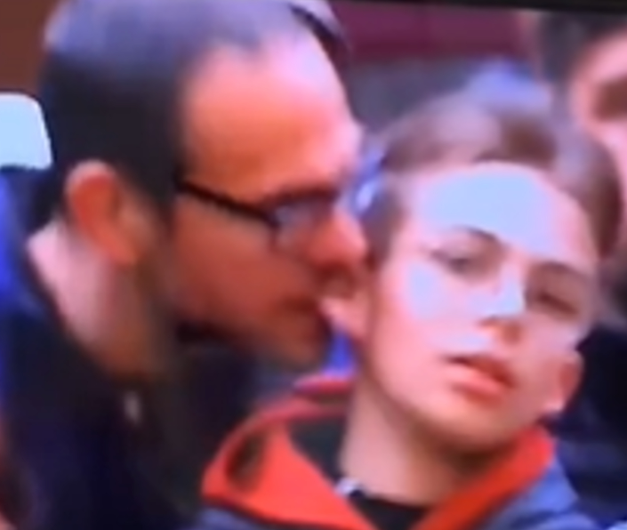 Man caught on live TV inappropriately touching a young boy at a Snooker tournament (video)