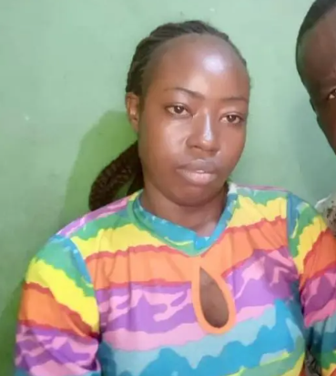 Outrage as masquerades brutally flog female nurse until she falls in a gutter in Enugu (video)