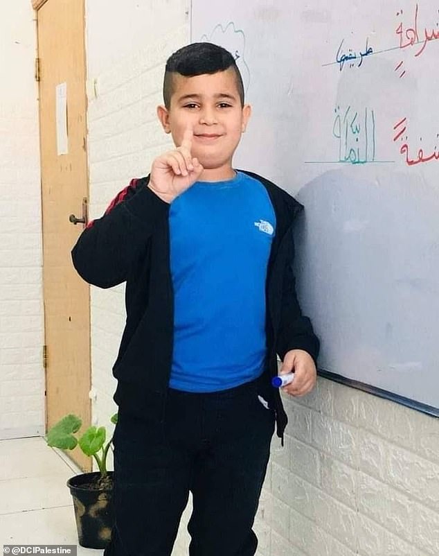 Israel accused of possible war crime after 8-year-old West Bank boy is shot in the head and killed as he ran�away�from�IDF